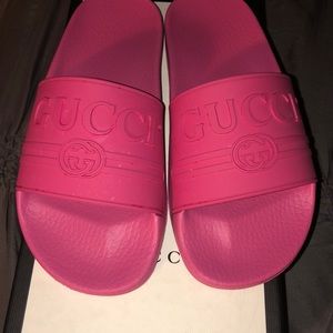 Pink Gucci flip flops